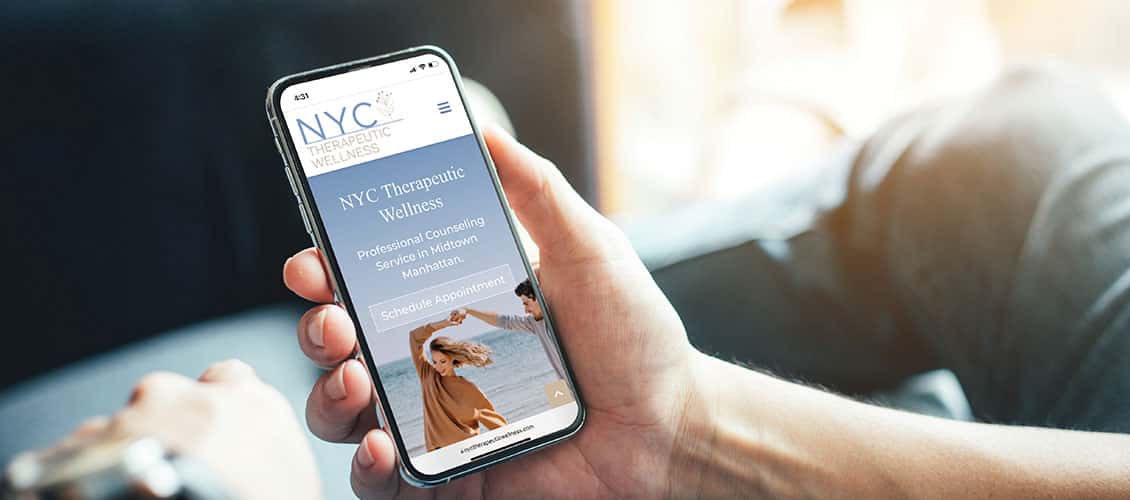 NYC Therapeutic website shown on mobile phone