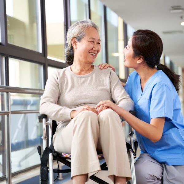 Healthcare worker comforting patient
